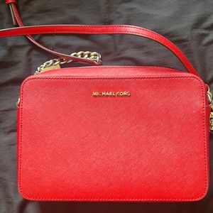 Red Michael Kors crossbody.